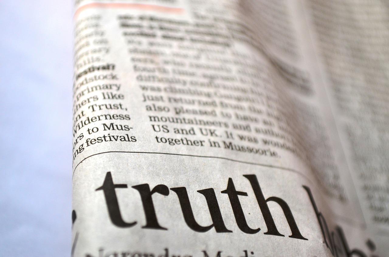 Truth title on a newspaper