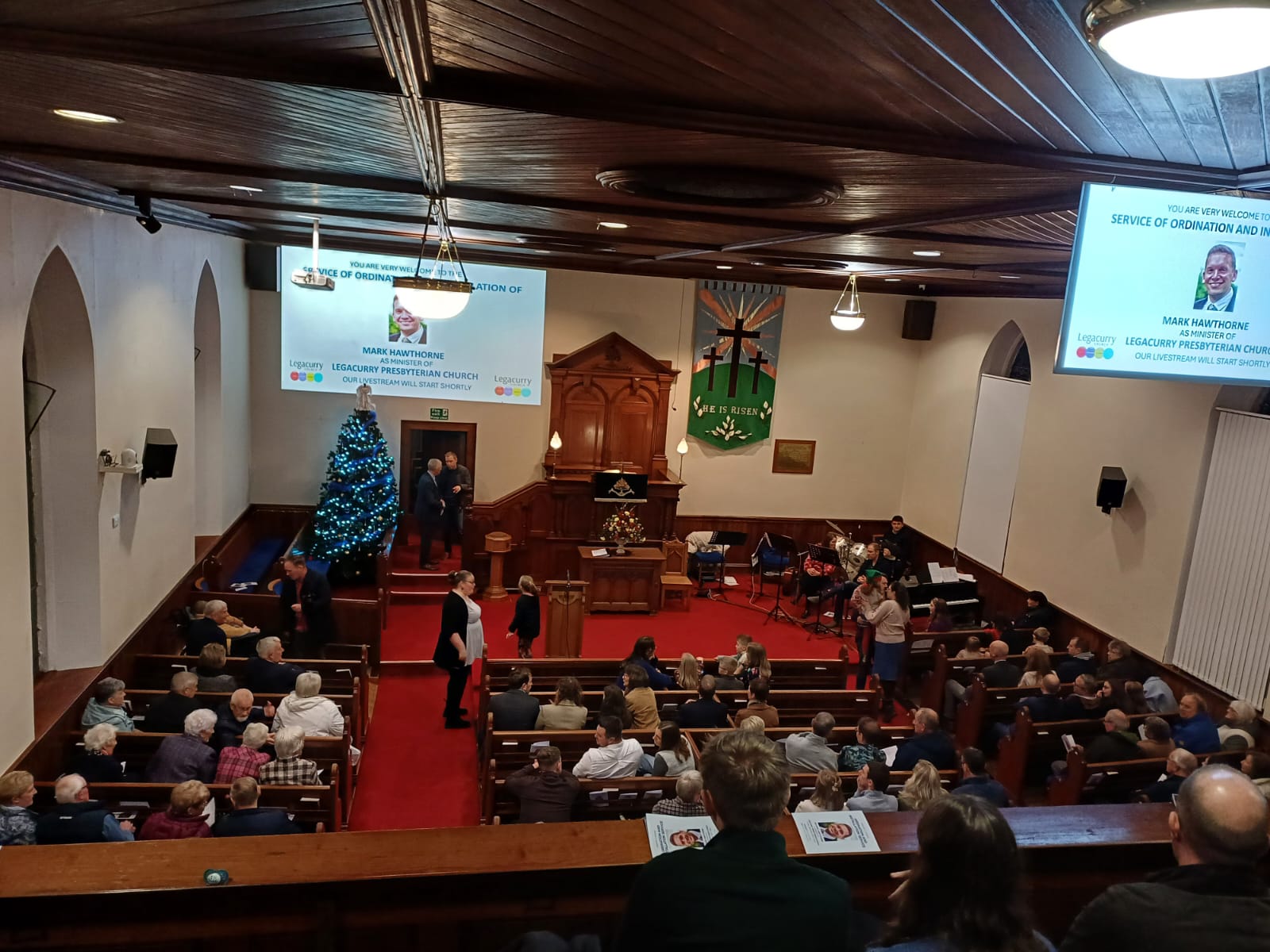 Inside Legacurry Presbyterian Church at the ordination and installation of Mark Hawthorne as the new minister.